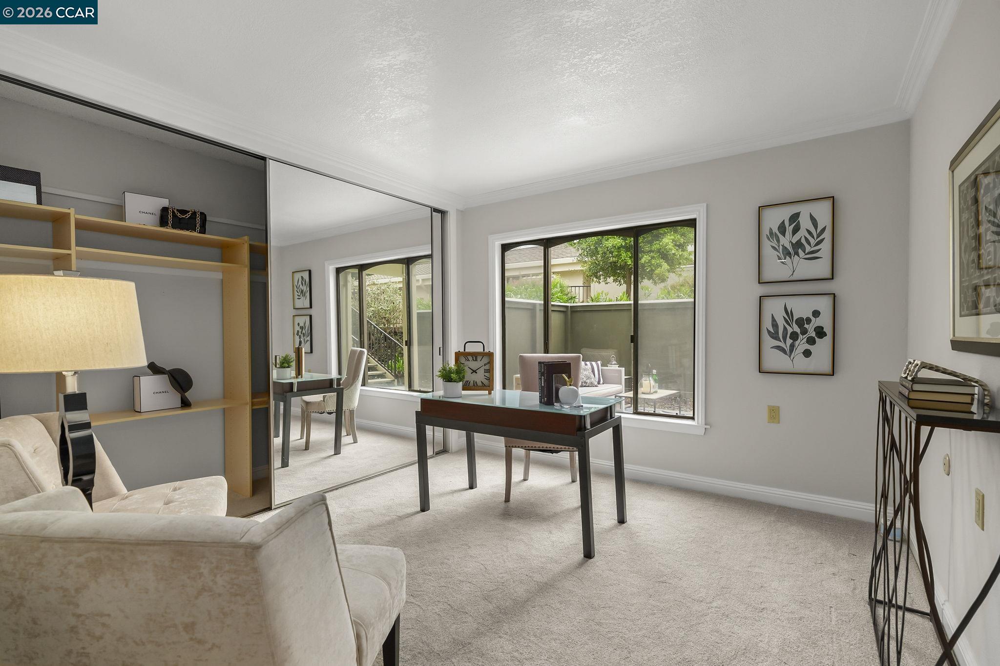 2057 Golden Rain Road, Unit 4 Walnut Creek, CA 94595 - Photo 19 of 20 a work room with furniture and a flat screen tv