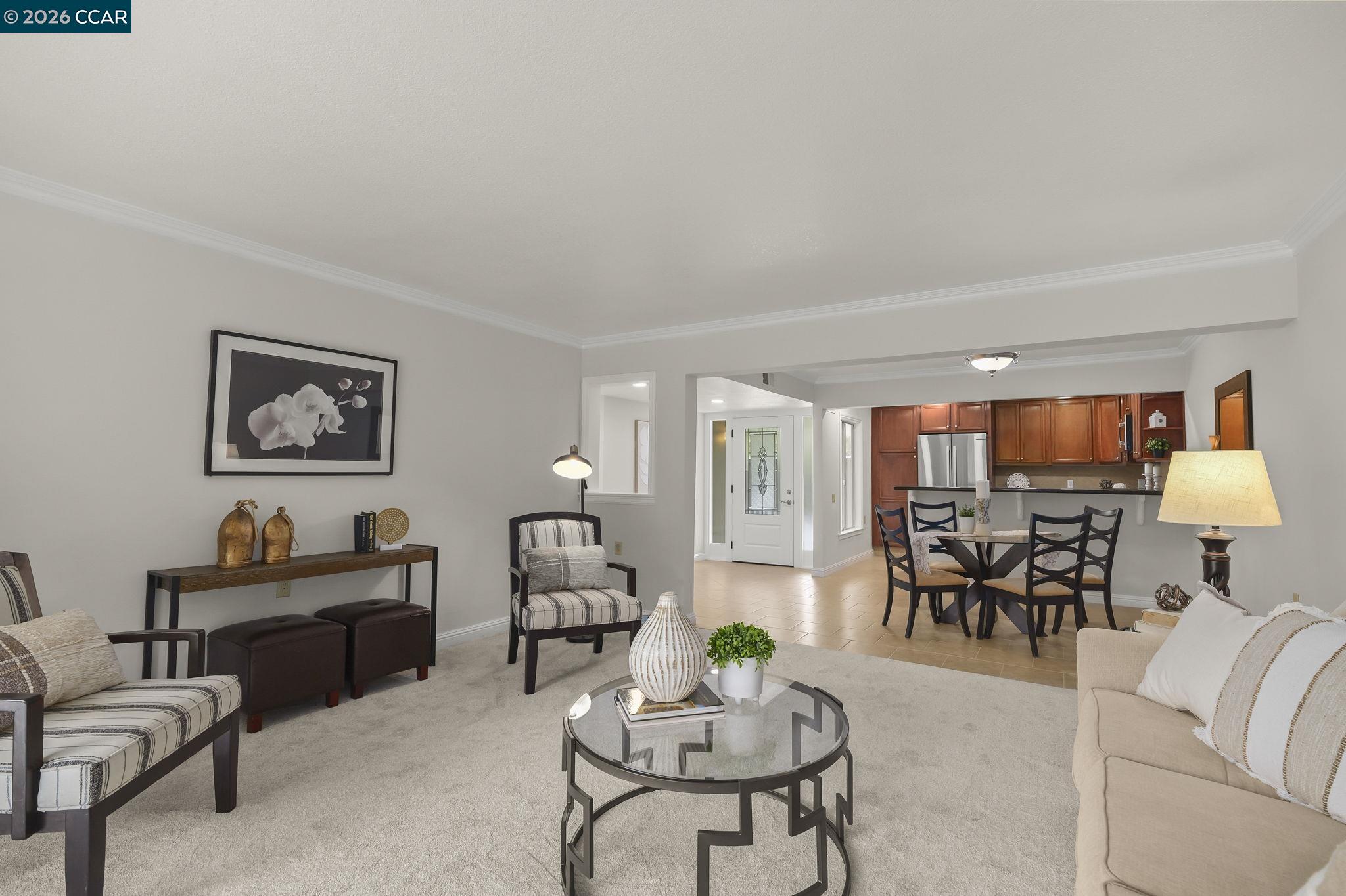 2057 Golden Rain Road, Unit 4 Walnut Creek, CA 94595 - Photo 9 of 20 a living room with furniture and a large window