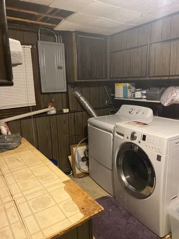 a utility room with dryer and washer