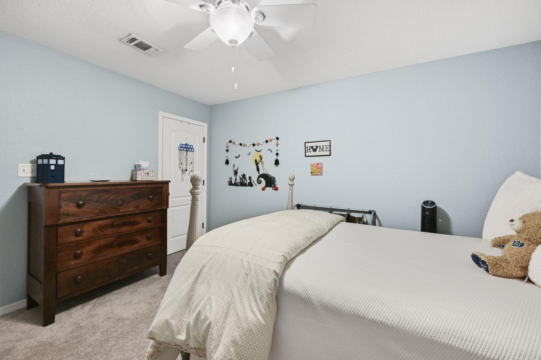 374 Driftwood Point Road Santa Rosa Beach, FL 32459 - Photo 15 of 35 a bedroom with a bed and a dresser
