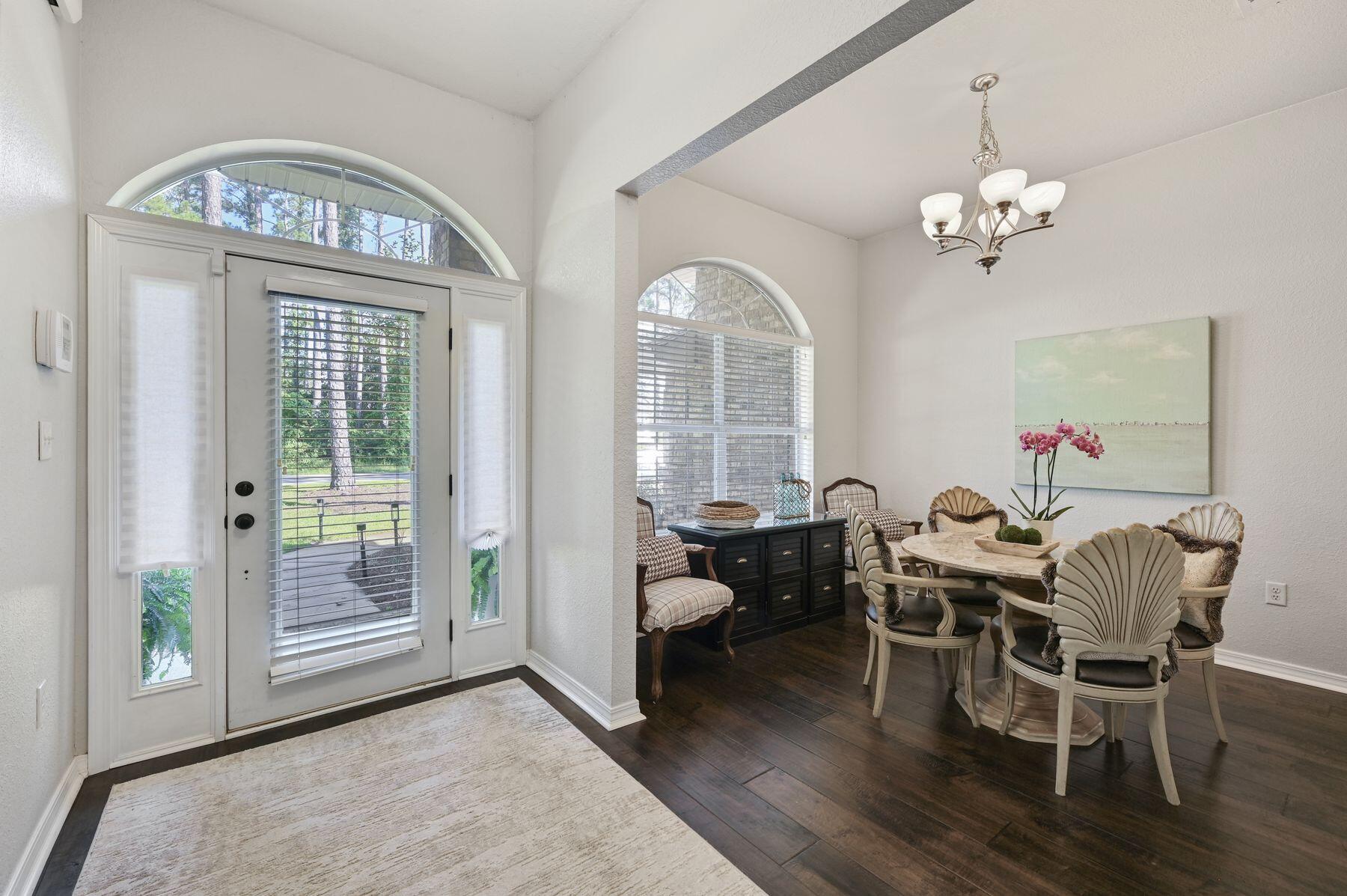 374 Driftwood Point Road Santa Rosa Beach, FL 32459 - Photo 24 of 35 a view of a livingroom with furniture window and wooden floor