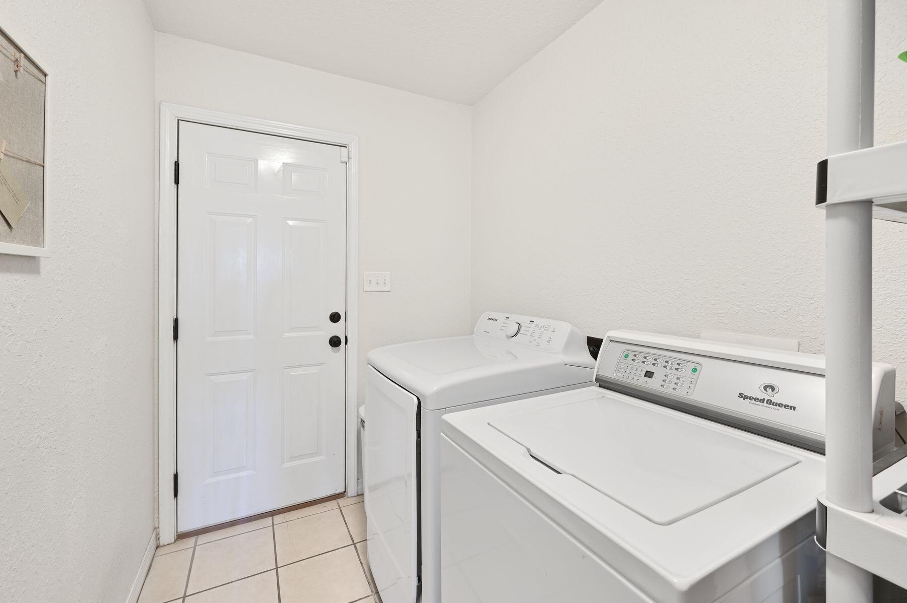 374 Driftwood Point Road Santa Rosa Beach, FL 32459 - Photo 26 of 35 a utility room with dryer and washer