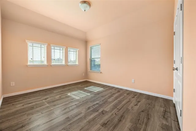a view of a house with swimming pool and sitting area