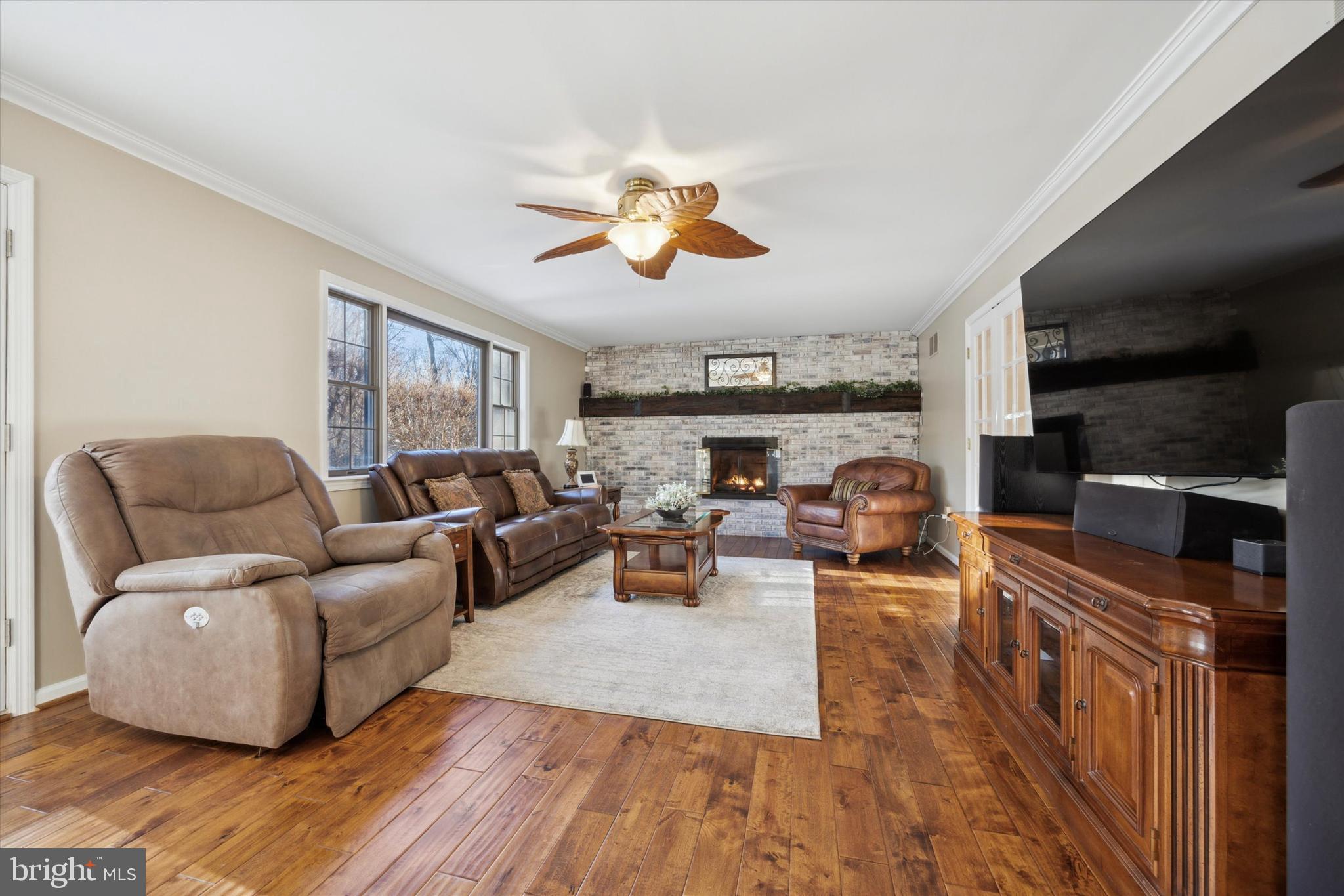 78 7 Stars Road Spring City, PA 19475 - Photo 16 of 117 a living room with furniture kitchen view and a fireplace