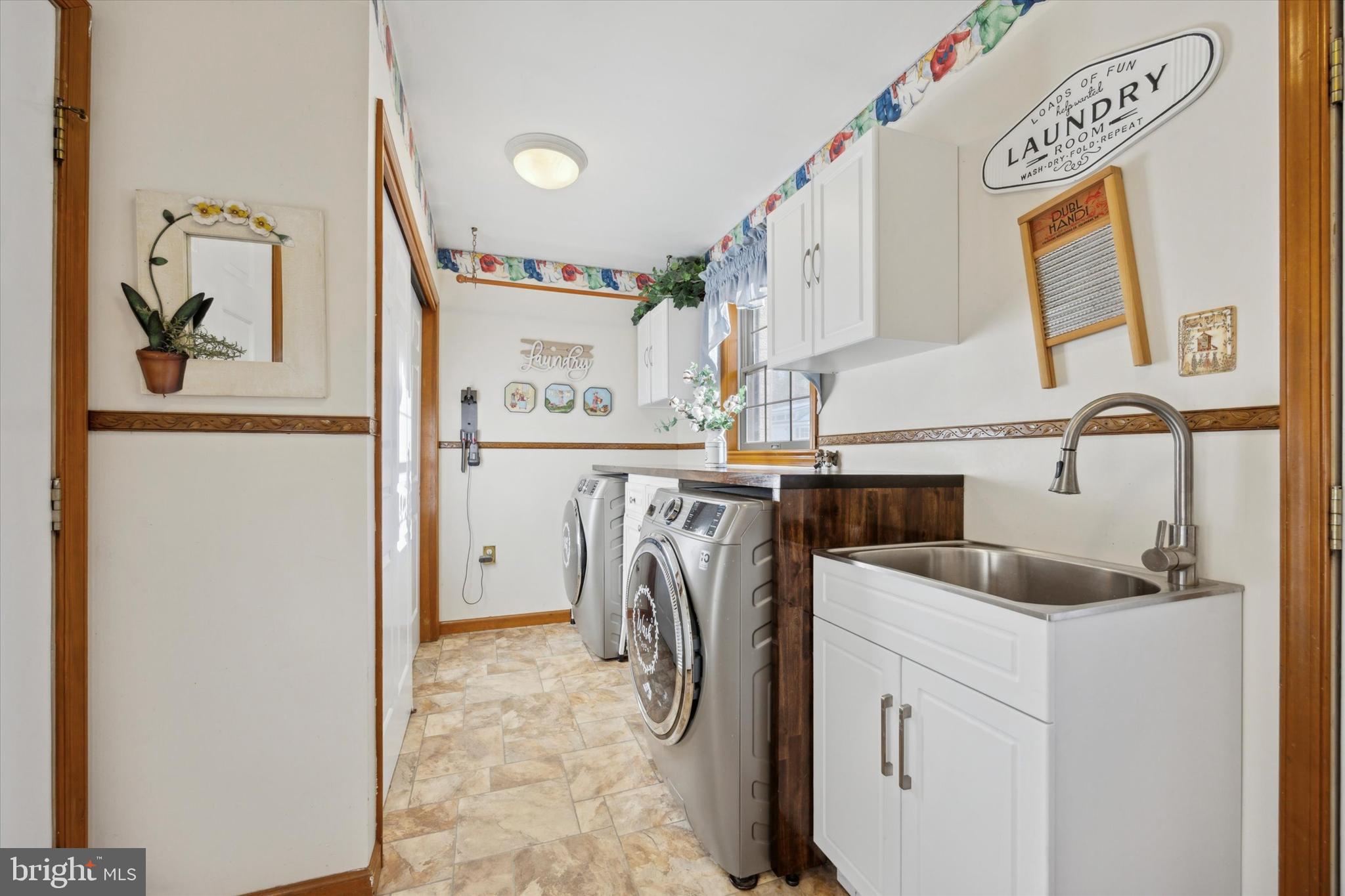 78 7 Stars Road Spring City, PA 19475 - Photo 28 of 117 a utility room with window dryer and washer