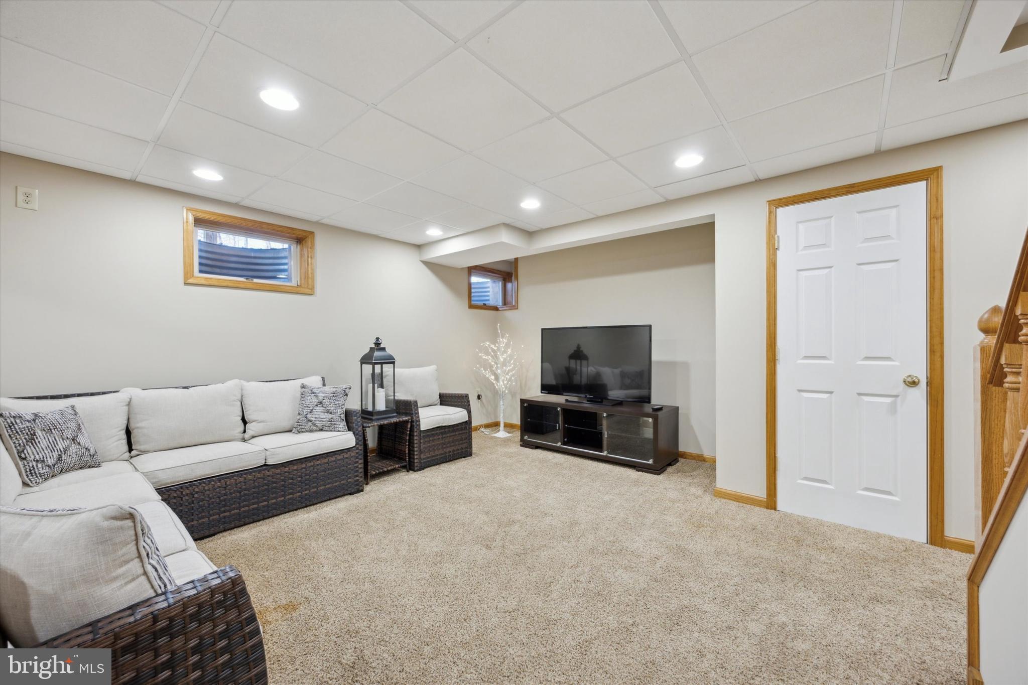 78 7 Stars Road Spring City, PA 19475 - Photo 54 of 117 a living room with furniture and a flat screen tv