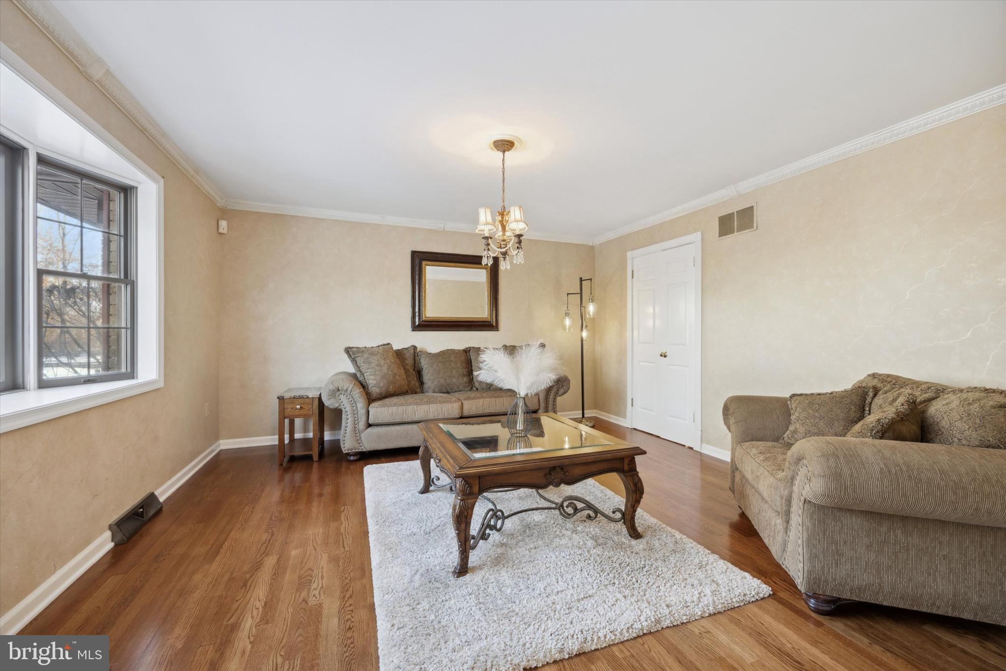78 7 Stars Road Spring City, PA 19475 - Photo 8 of 117 a living room with furniture and a wooden floor