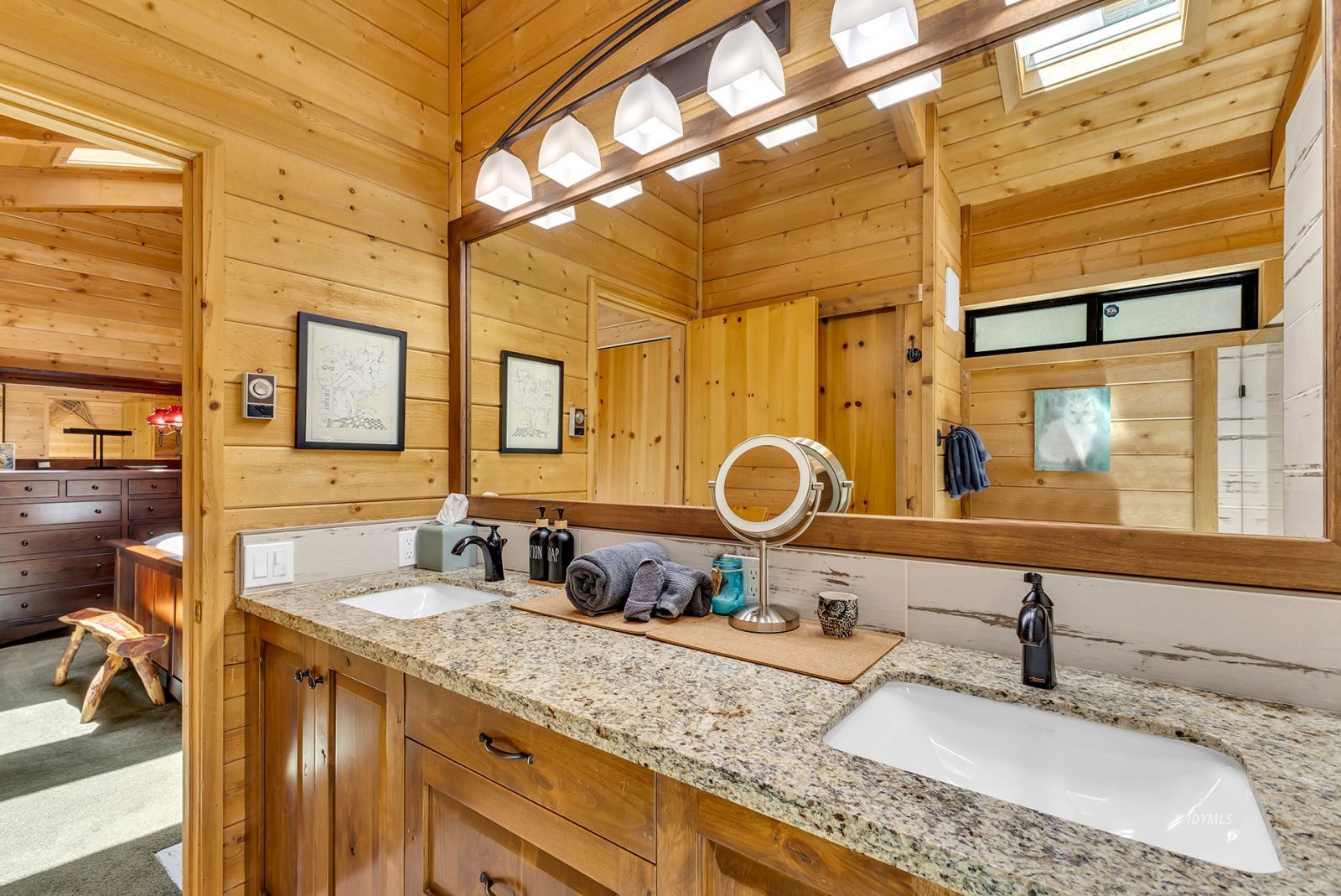 24924 Fern Valley Road Idyllwild, CA 92549 - Photo 72 of 72 a bathroom with a granite countertop sink and a mirror