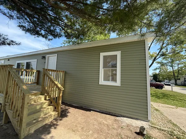 a view of a house with a patio
