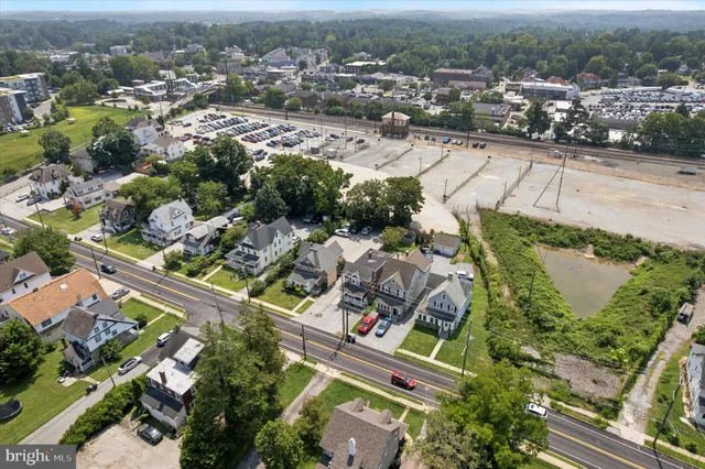 an aerial view of house with yard