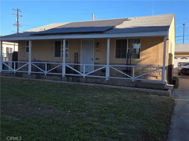 a house view with a garden space