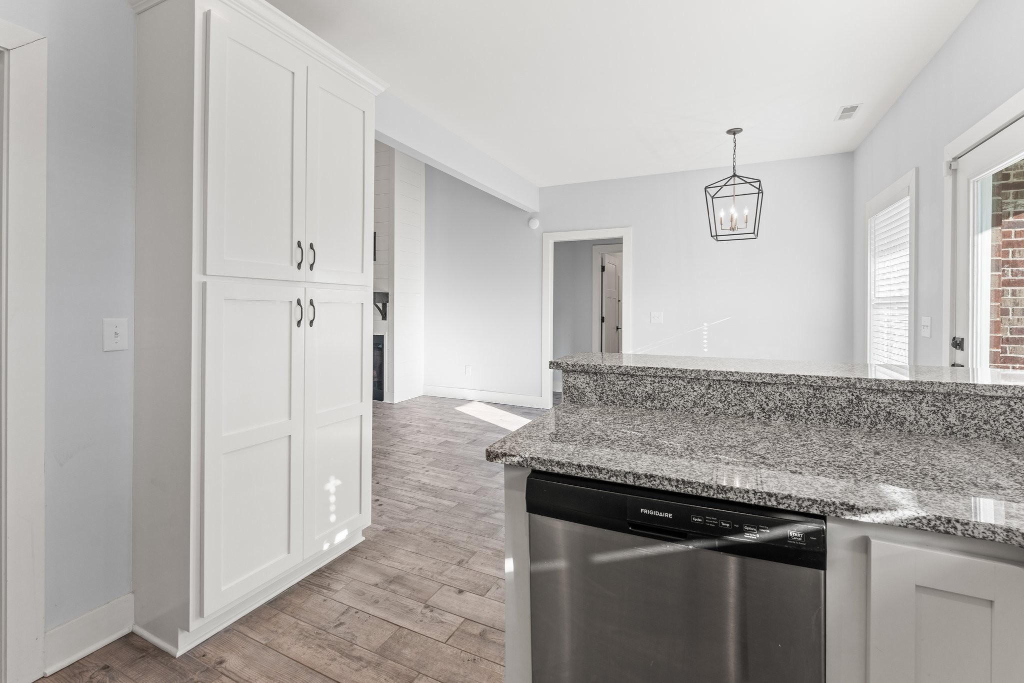 1295 Old Estill Springs Road Winchester, TN 37398 - Photo 13 of 34 a kitchen with granite countertop a sink cabinets and stainless steel appliances