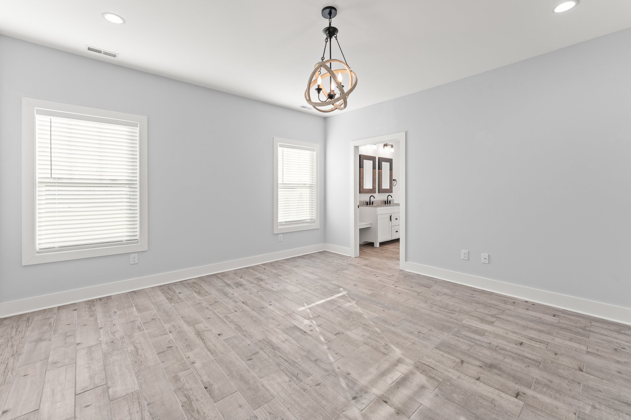 1295 Old Estill Springs Road Winchester, TN 37398 - Photo 15 of 34 wooden floor in an empty room with a window