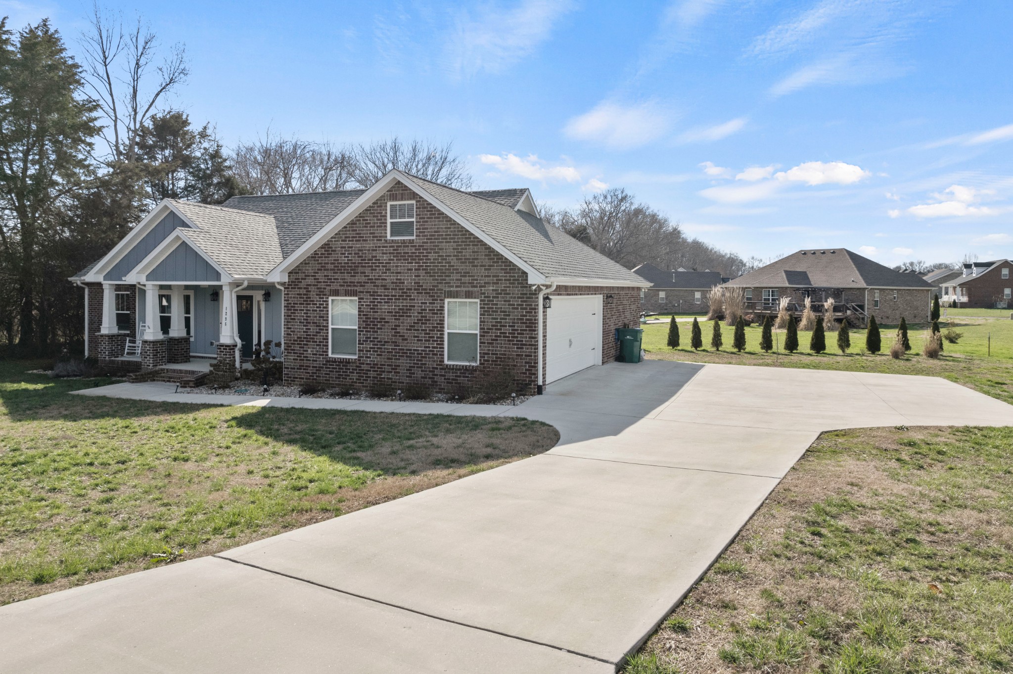 1295 Old Estill Springs Road Winchester, TN 37398 - Photo 2 of 34 a front view of a house with a yard