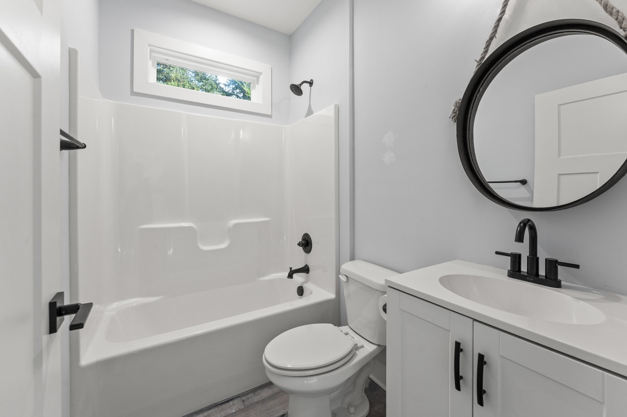 1295 Old Estill Springs Road Winchester, TN 37398 - Photo 26 of 34 a bathroom with a sink a toilet and a mirror