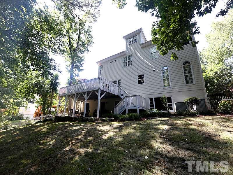 2805 Rothgeb Drive Raleigh, NC 27609 - Photo 24 of 25 a front view of a house with a yard