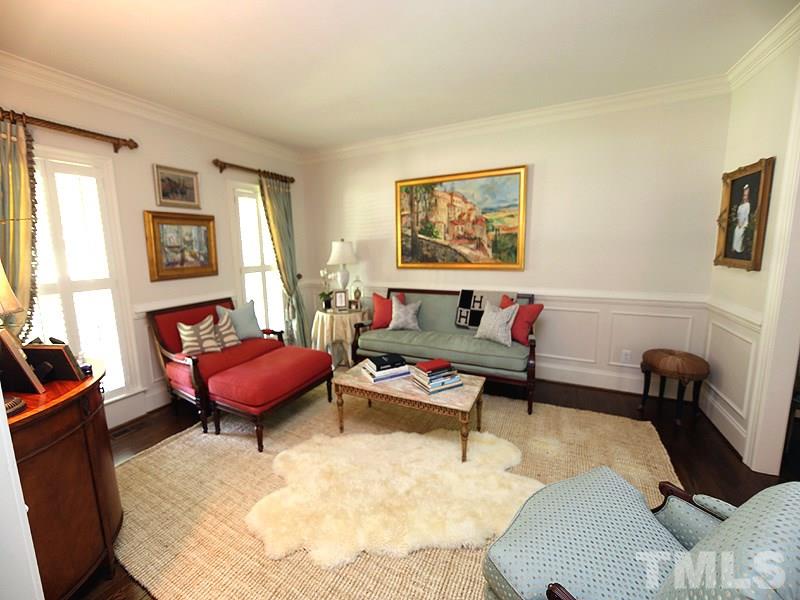 2805 Rothgeb Drive Raleigh, NC 27609 - Photo 8 of 25 a living room with furniture a rug and a window