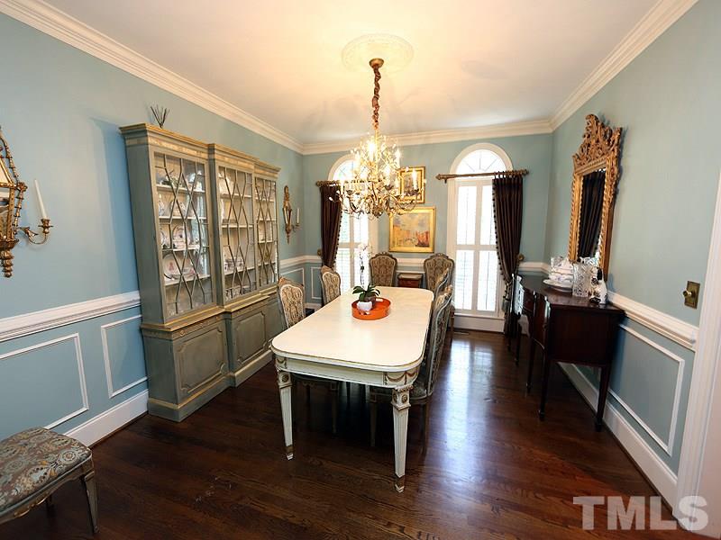 2805 Rothgeb Drive Raleigh, NC 27609 - Photo 9 of 25 a view of a dining room with furniture window and wooden floor