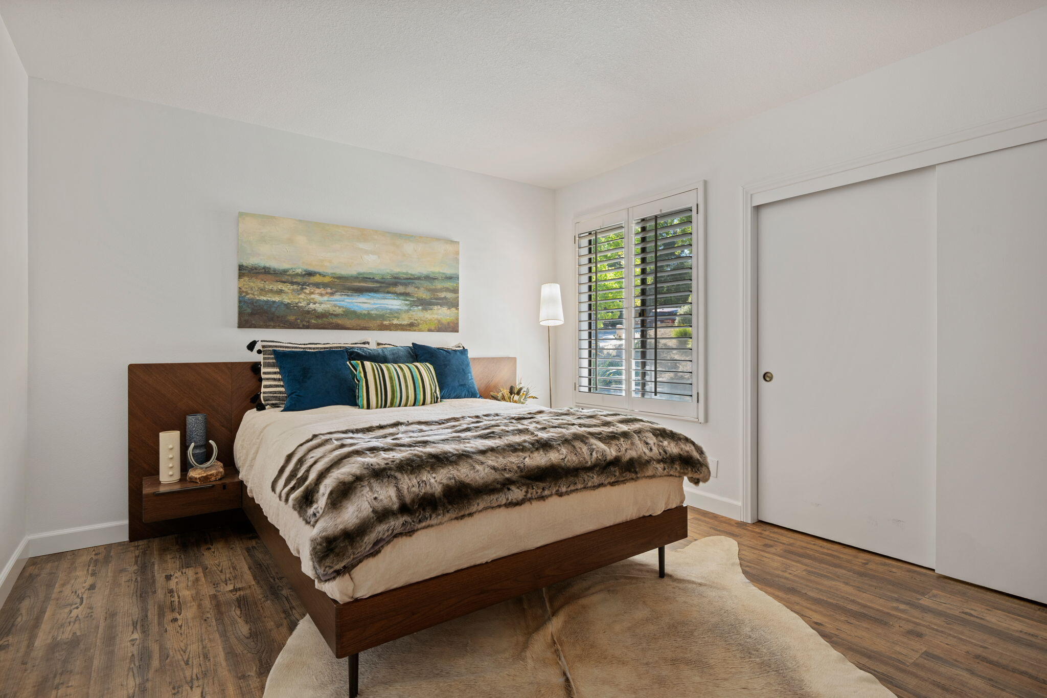 793 Alisal Road Solvang, CA 93463 - Photo 24 of 44 a bed sitting in a bedroom next to a window