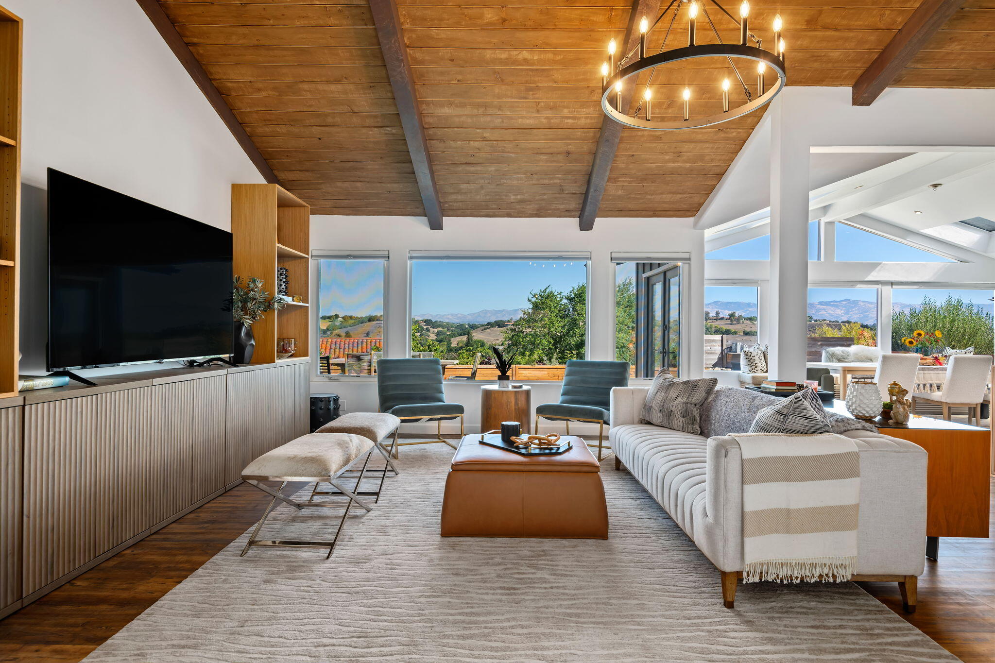 793 Alisal Road Solvang, CA 93463 - Photo 4 of 44 a living room with furniture and a flat screen tv