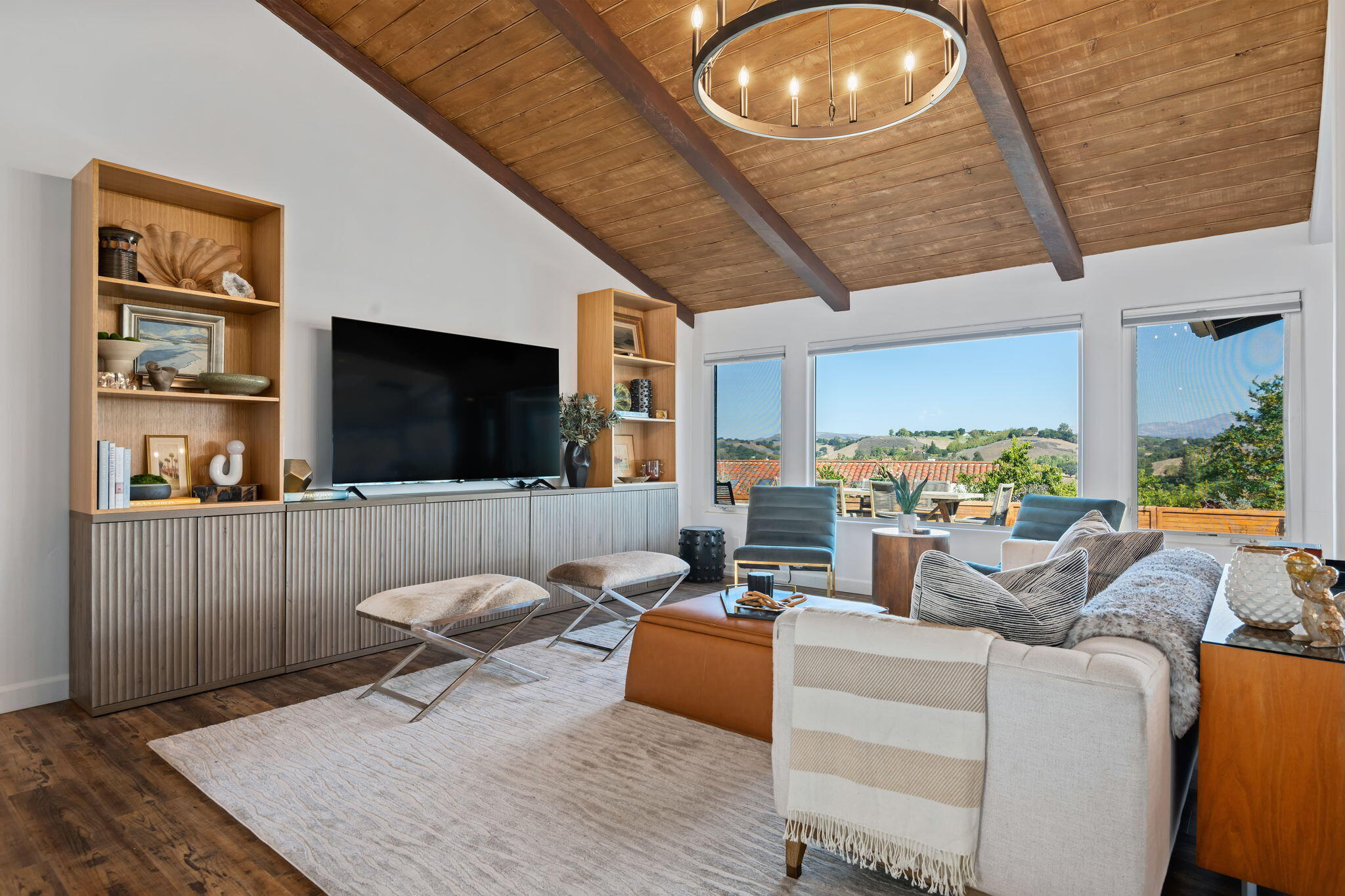793 Alisal Road Solvang, CA 93463 - Photo 5 of 44 a living room with furniture and a flat screen tv
