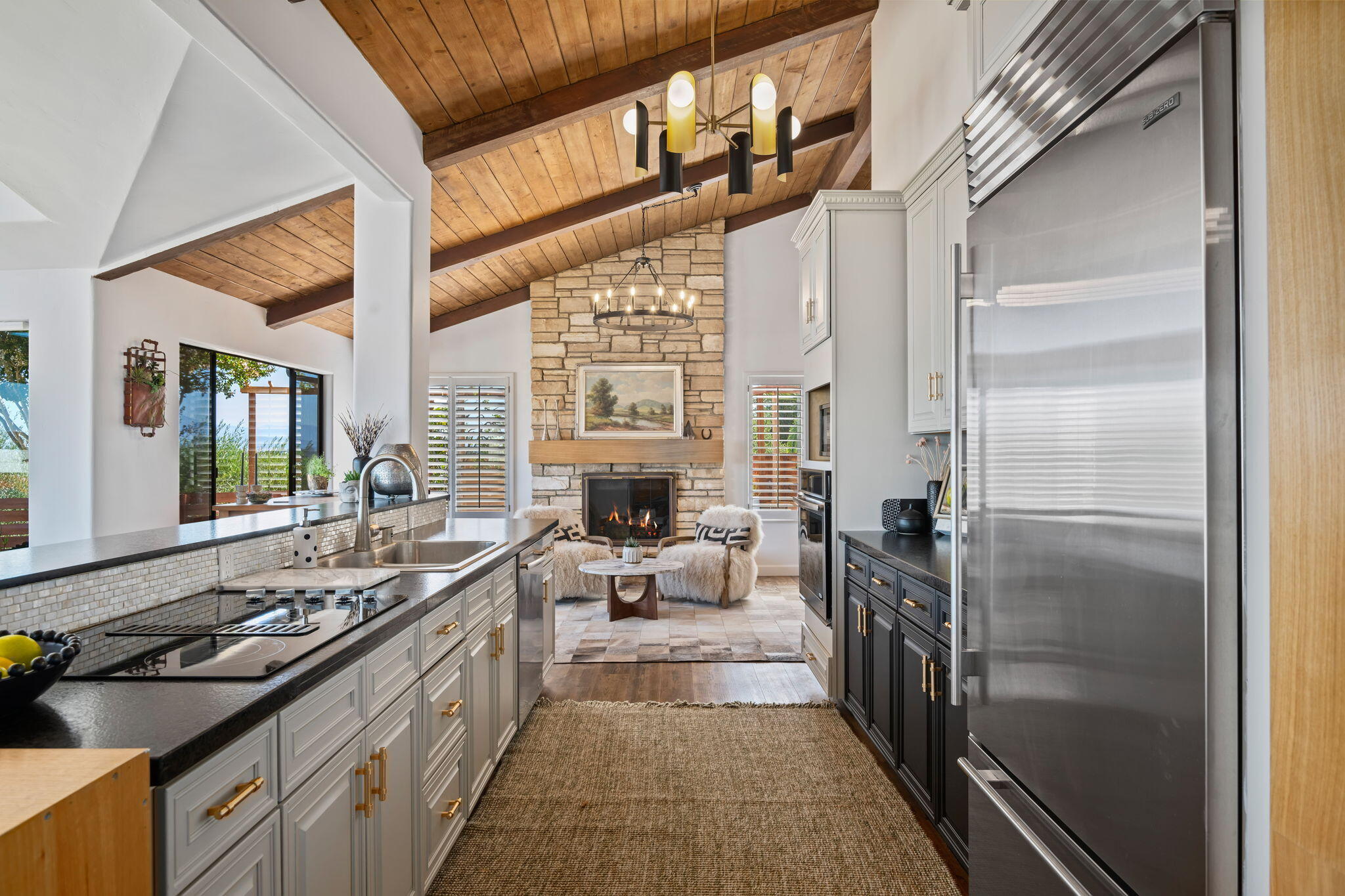 793 Alisal Road Solvang, CA 93463 - Photo 8 of 44 a kitchen with stainless steel appliances granite countertop a sink stove and refrigerator