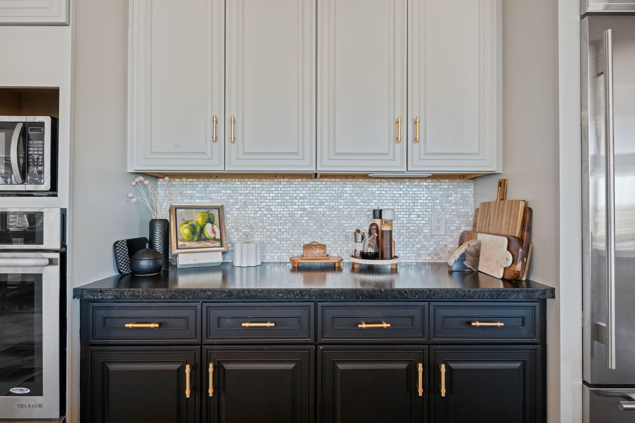 793 Alisal Road Solvang, CA 93463 - Photo 10 of 44 a kitchen with a sink and cabinets