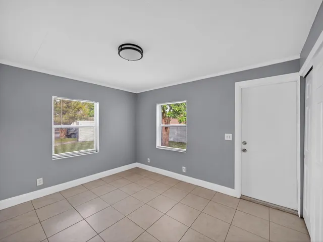 an empty room with windows