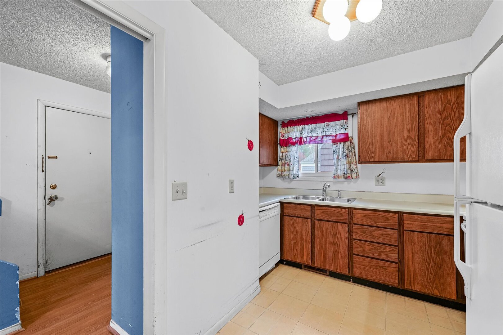 1928 Blackthorn Drive, Unit 1 Champaign, IL 61821 - Photo 11 of 28 a utility room with cabinets washer and dryer