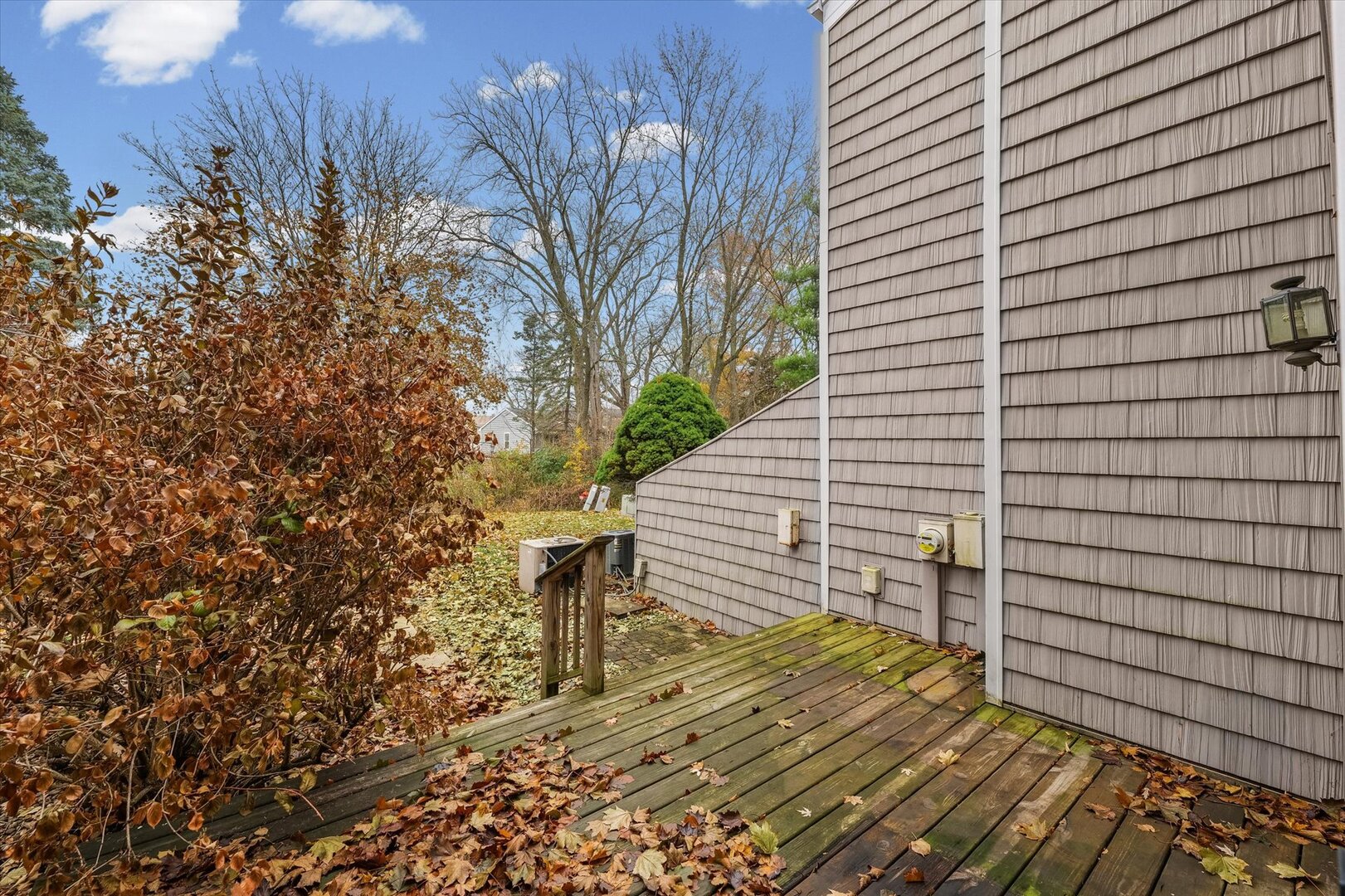 1928 Blackthorn Drive, Unit 1 Champaign, IL 61821 - Photo 24 of 28 a view of a backyard with sitting area