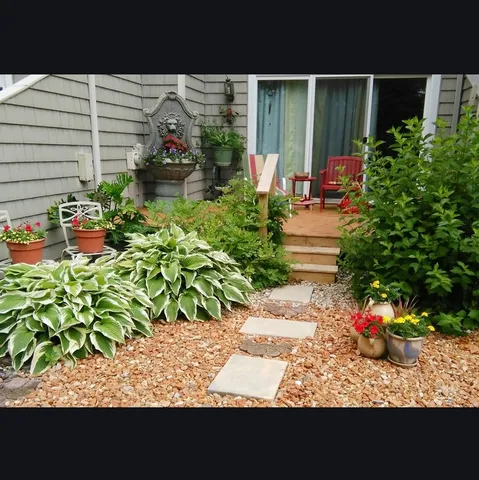 a view of a backyard with a garden