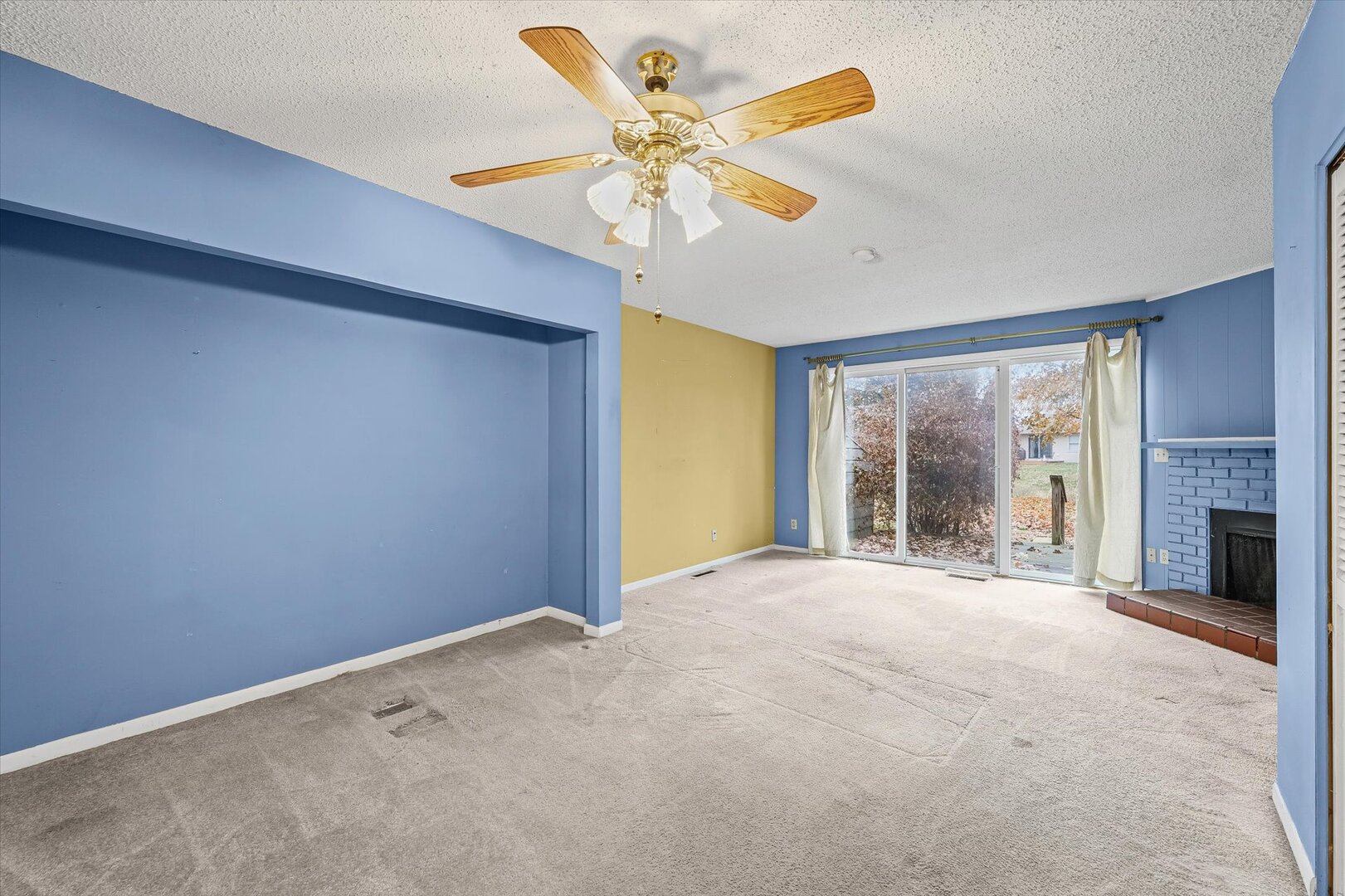 1928 Blackthorn Drive, Unit 1 Champaign, IL 61821 - Photo 6 of 28 a view of an empty room with a window