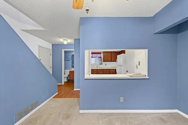 a view of a hallway with entryway