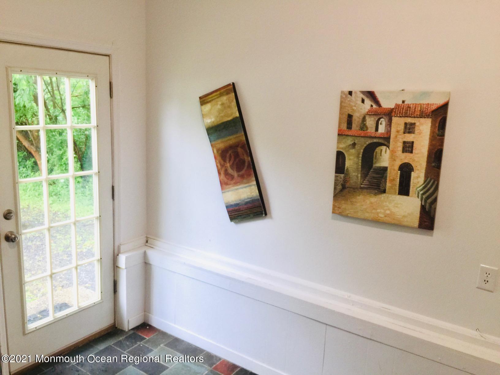 59 Aberdeen Road Matawan, NJ 07747 - Photo 22 of 34 a bathroom with a toilet and a window