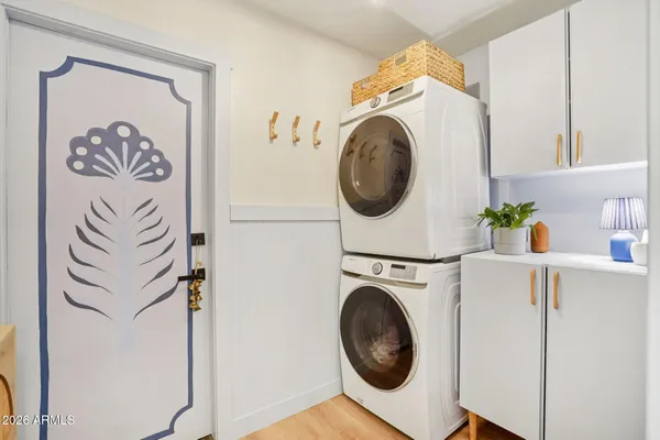 a utility room with dryer and washer