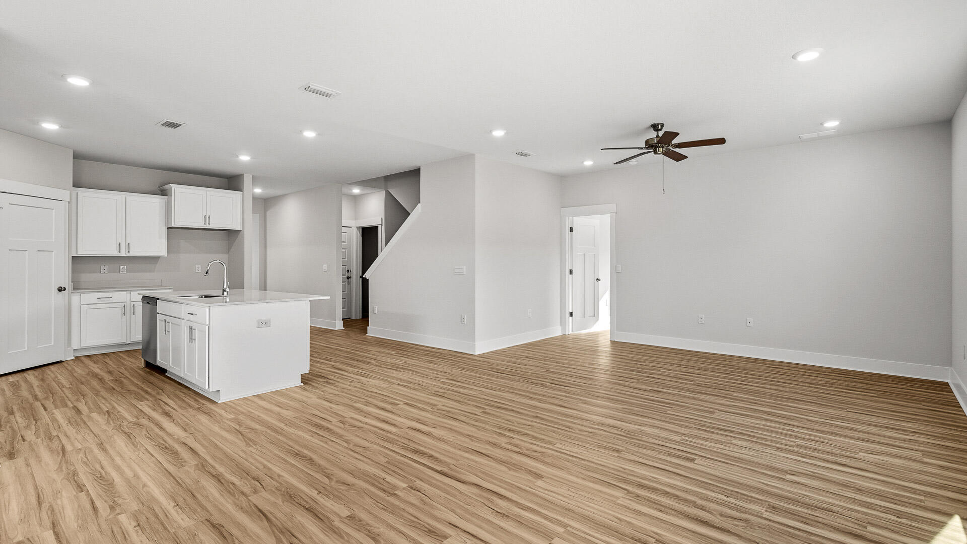 4673 Marine Loop Crestview, FL 32539 - Photo 6 of 34 a view of an empty room with kitchen appliances and a window