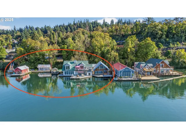 a swimming pool with trees in the background