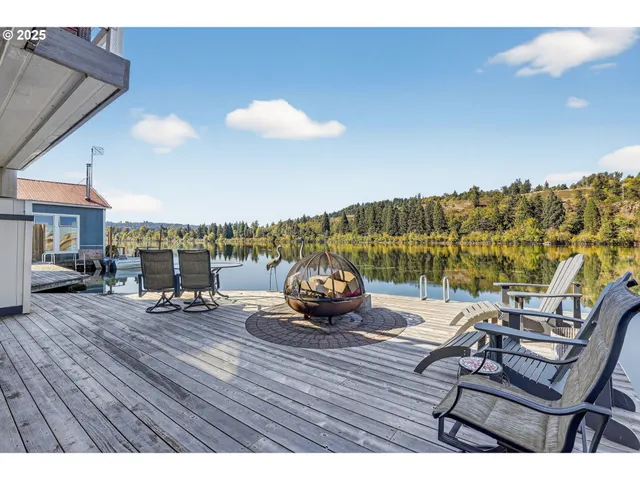 a living room with furniture fireplace and a flat screen tv