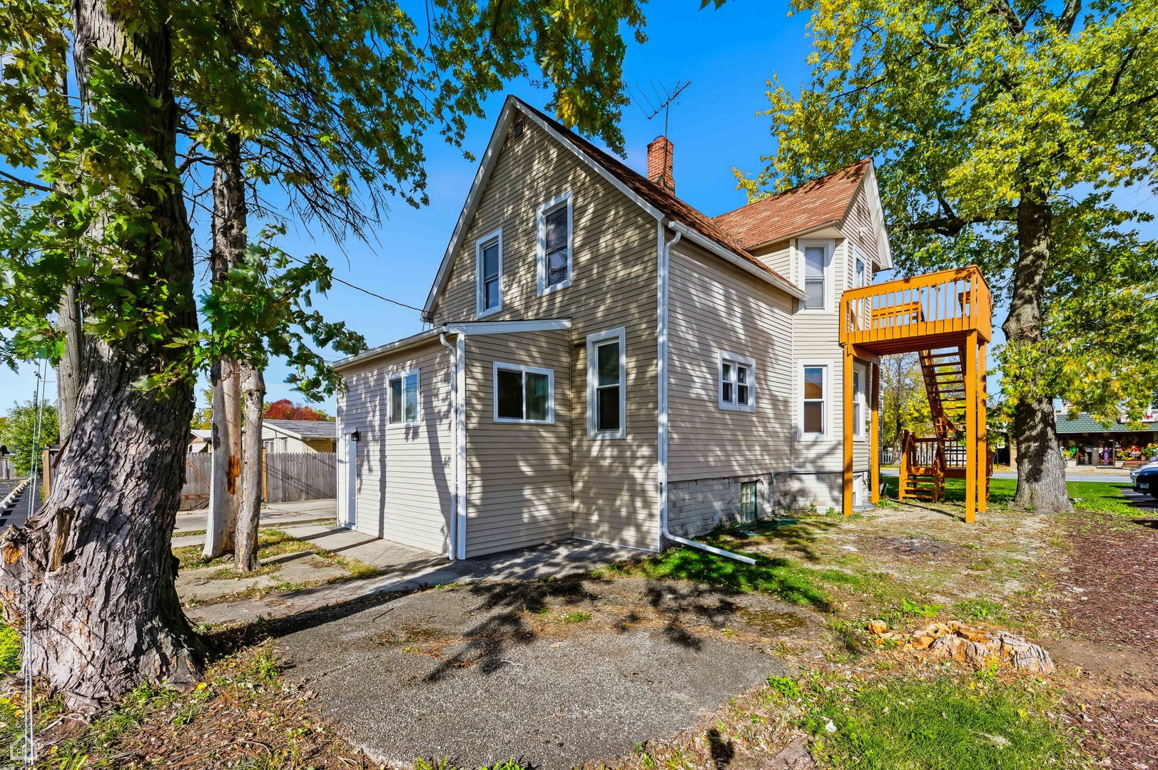 7635 West Foster Avenue Chicago, IL 60656 - Photo 23 of 24 a view of a house with a yard