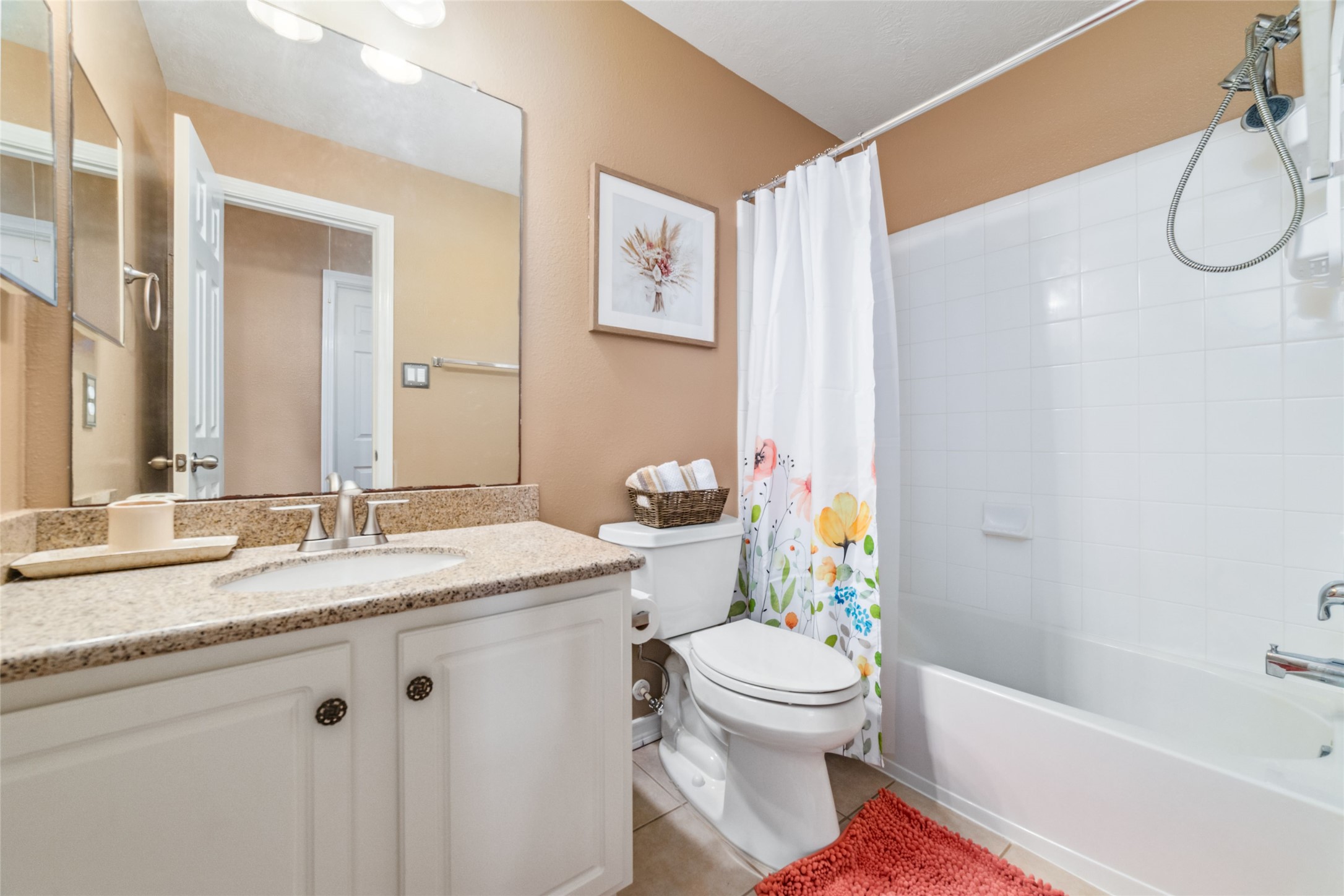 203 West Stedhill Loop Conroe, TX 77384 - Photo 20 of 45 a bathroom with a granite countertop sink mirror vanity and toilet