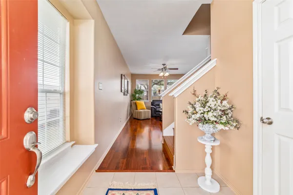 a view of entryway with wooden floor