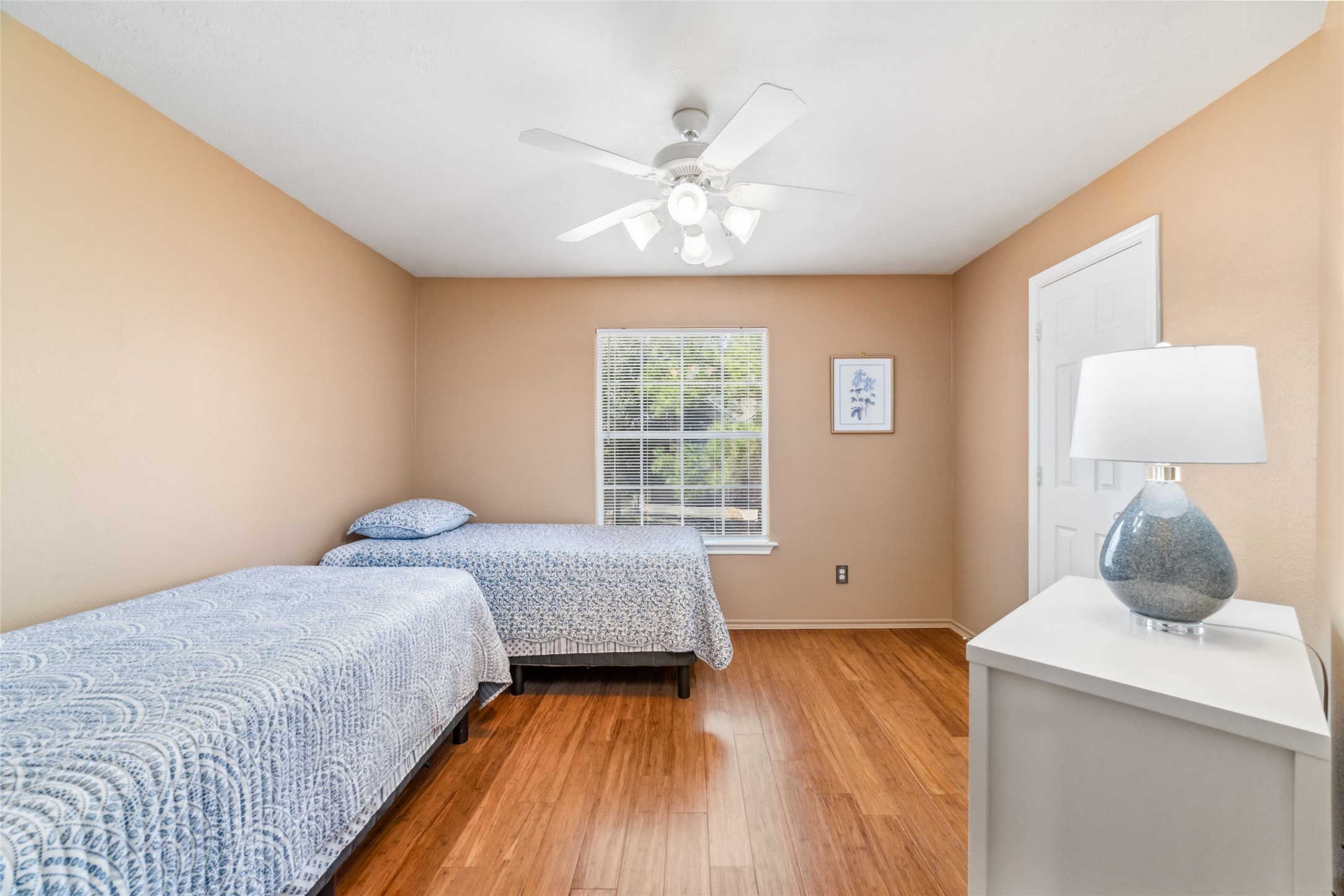 203 West Stedhill Loop Conroe, TX 77384 - Photo 23 of 45 a bedroom with a bed and a window