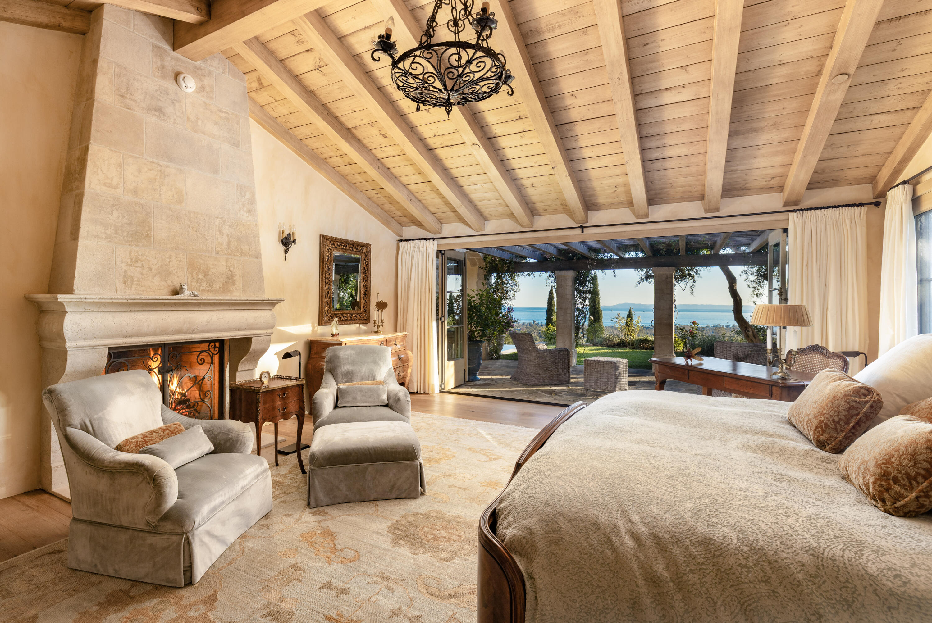 965 Brooktree Road Montecito, CA 93108 - Photo 12 of 26 a large bedroom with furniture and large windows