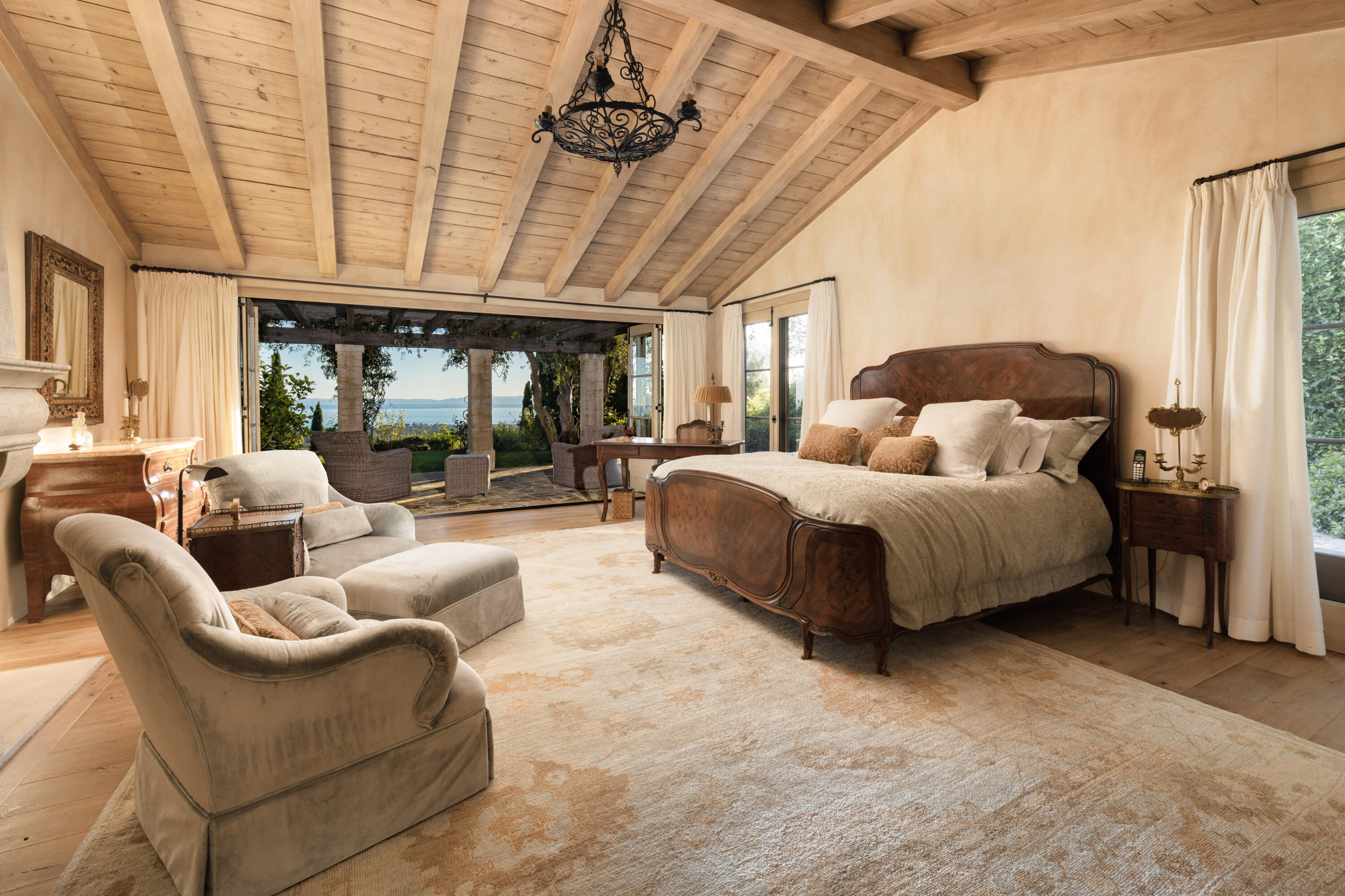 965 Brooktree Road Montecito, CA 93108 - Photo 13 of 26 a spacious bedroom with bed and window