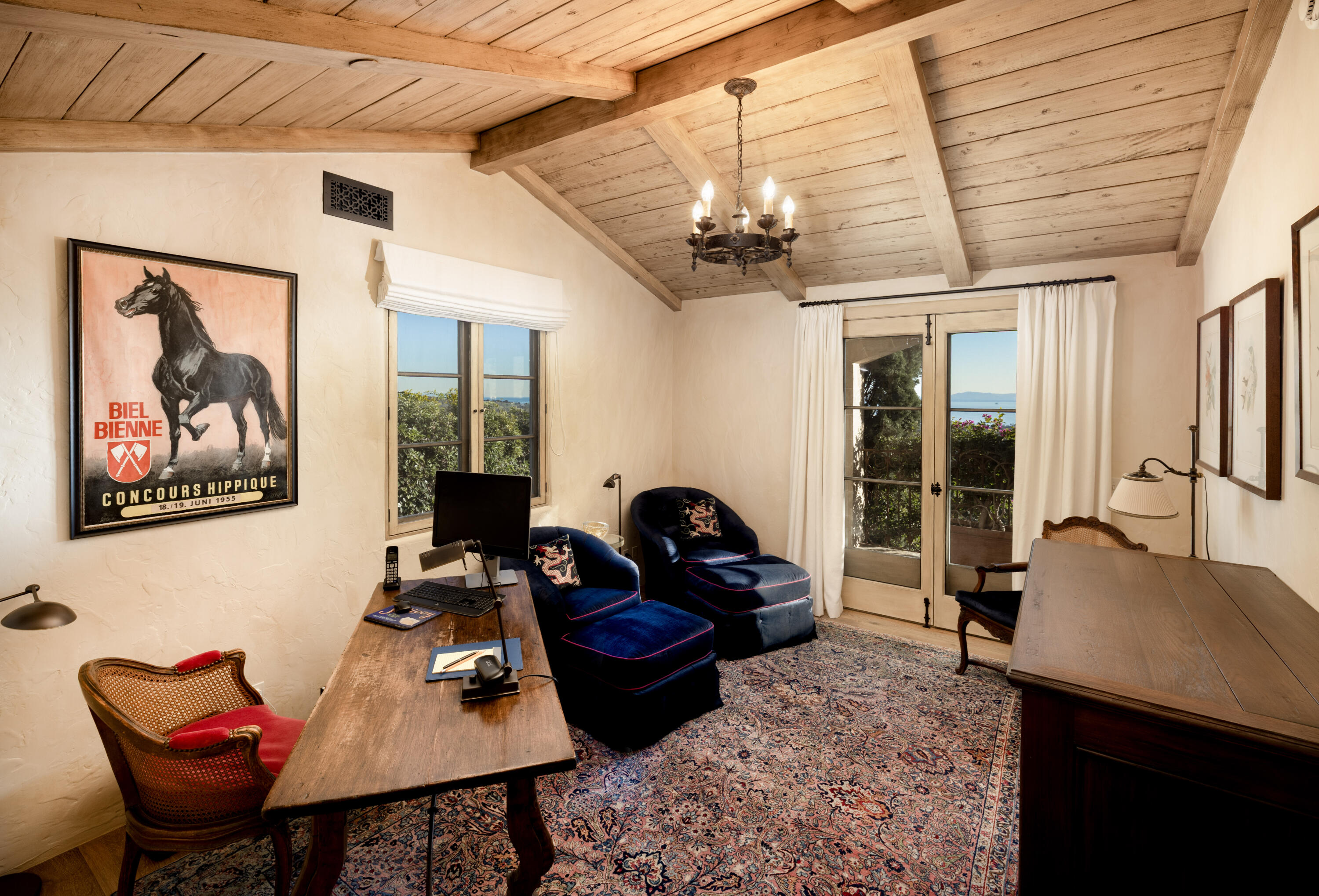 965 Brooktree Road Montecito, CA 93108 - Photo 16 of 26 a living room with furniture a flat screen tv and a table