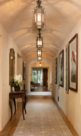 a lobby room with furniture and windows
