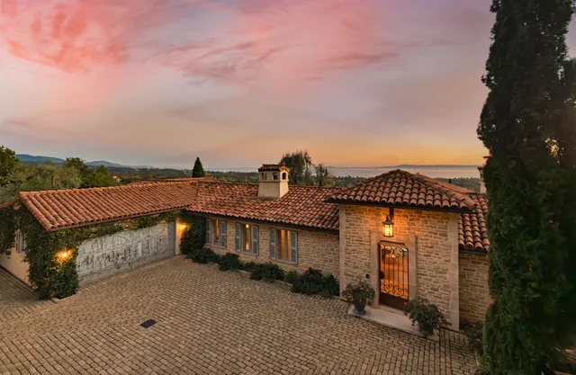 a view of a terrace with sitting area