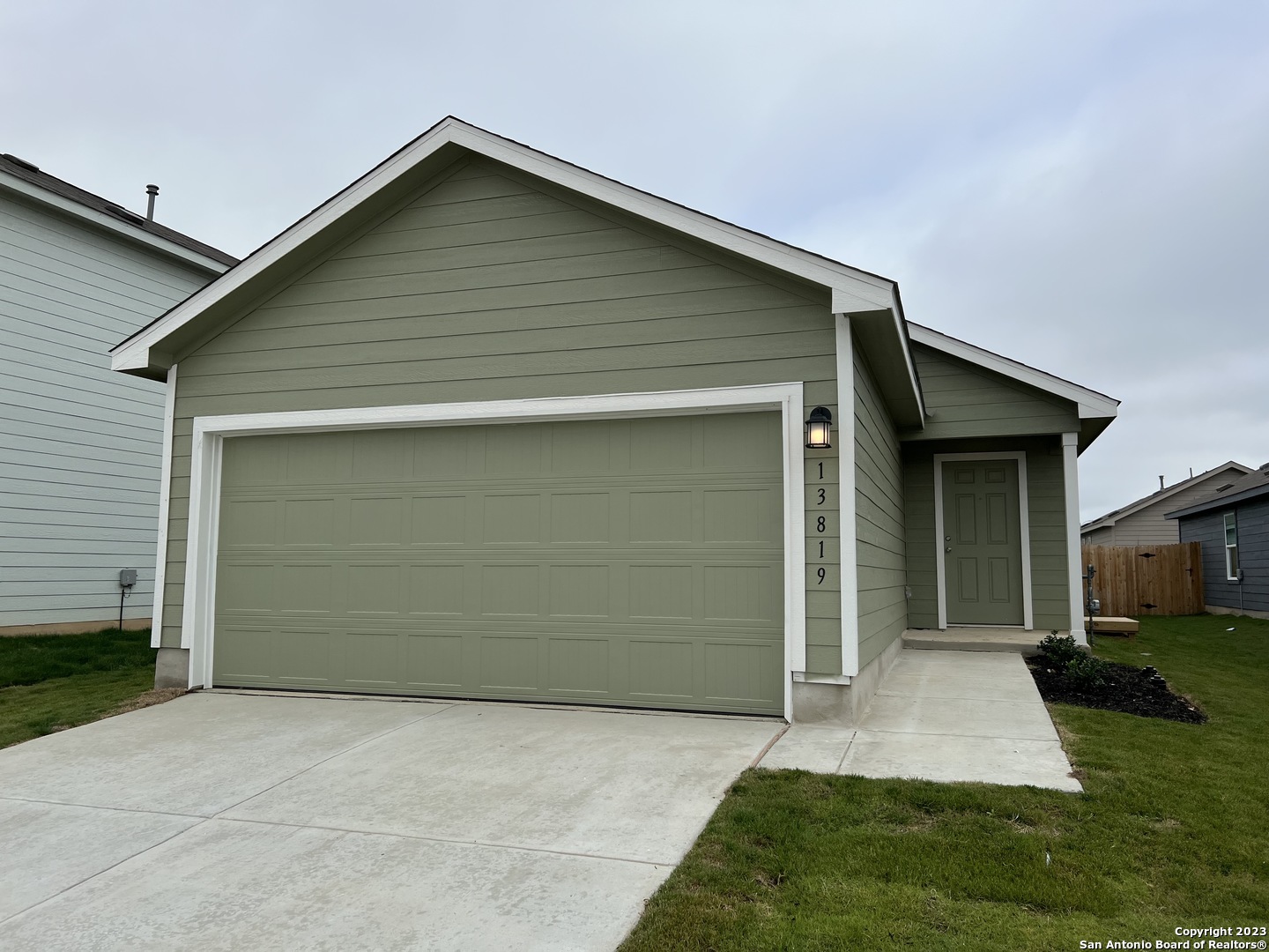 13819 Llama Place San Antonio, TX 78252 - Photo 1 of 37 a front view of a house with garage