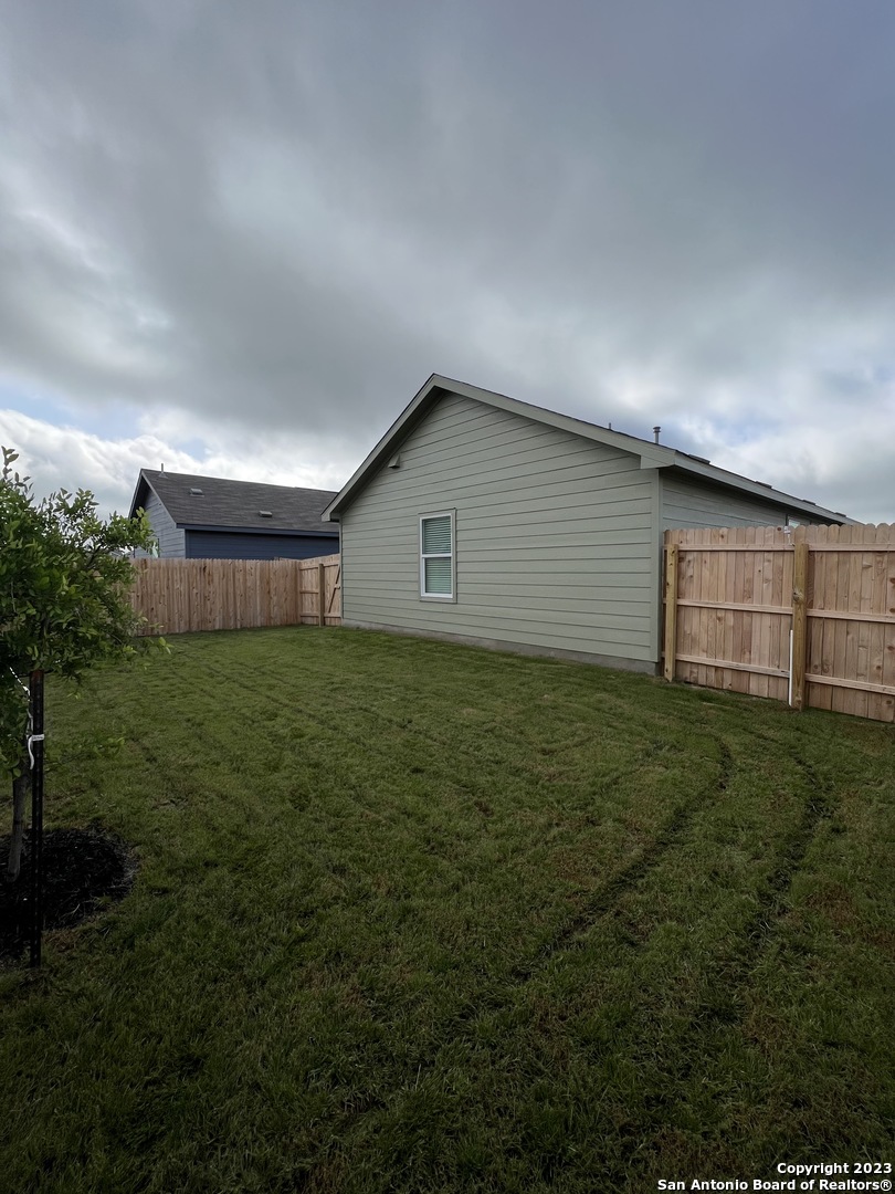 13819 Llama Place San Antonio, TX 78252 - Photo 36 of 37 a house view with a garden space