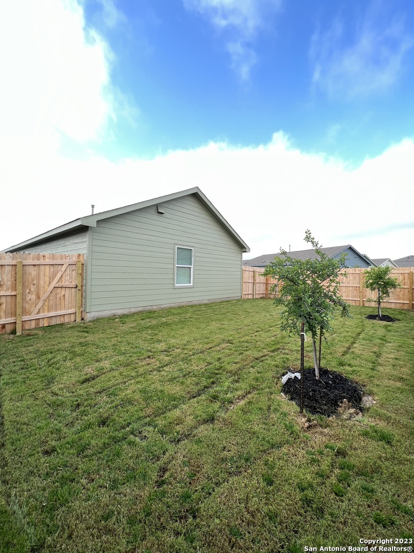 13819 Llama Place San Antonio, TX 78252 - Photo 37 of 37 a house view with a garden space